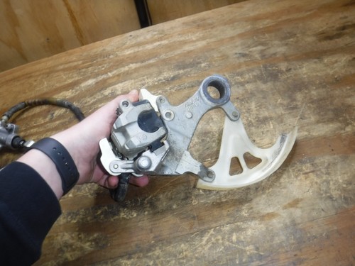 2010 RMZ250 Rear Brake Assembly Hose Line Caliper Master Cylinder - Picture 10 of 11