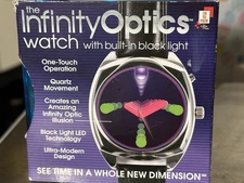 INFINITY OPTICS WATCH WITH BUILT IN BLACK LIGHT NEW IN BOX  New Dimension
