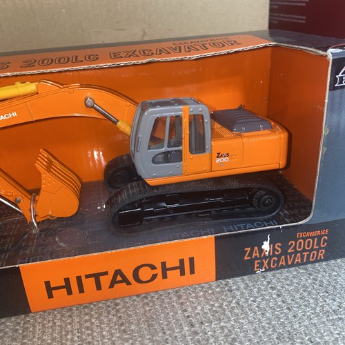 EXCAVADORA DE ORUGAS ERTL.BRITÁNICOS.1:50.HITACHI ZAXIS 200LC 360.EXCAVADORA.CARGADORA.EN CAJA - Imagen 3 de 9