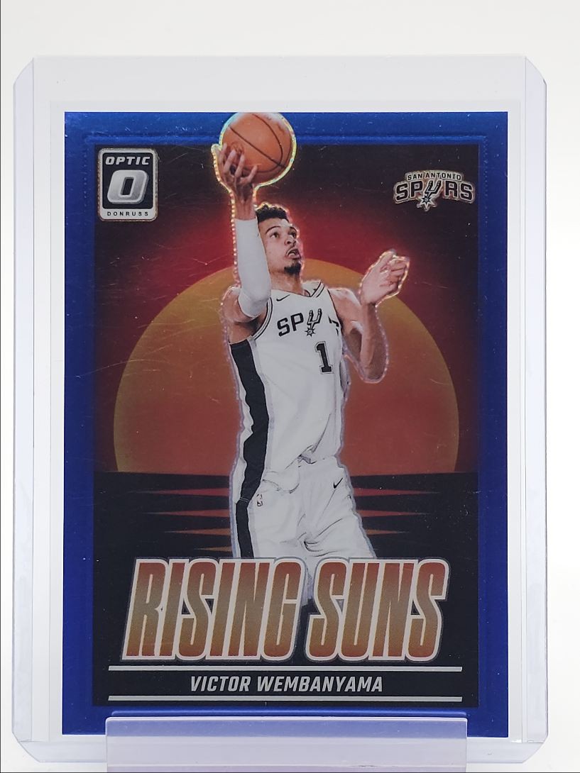 VICTOR WEMBANYAMA 2024-25 DONRUSS OPTIC RISING SUNS BLUE PRIZM /49 Q4832