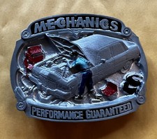 MECHANICS PERFORMANCE GUARANTEED BELT BUCKLE NEW APPROXIMATELY 3" X 2 1/4"