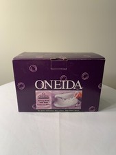 Fine Porcelain Gravy boat and tray with blue lattice flower decorations.