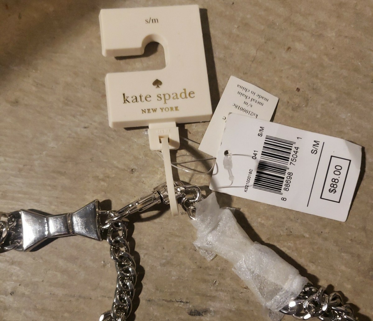Kate Spade SILVER CHAIN BOW Belt Accented with hanging Bow 