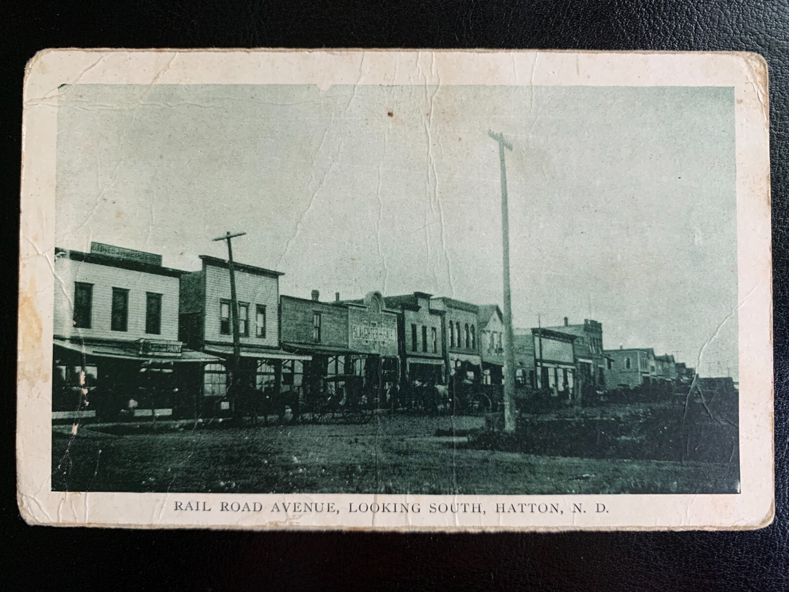 Rail Road Avenue, Looking South, Hatton, North Dakota postcard. Early