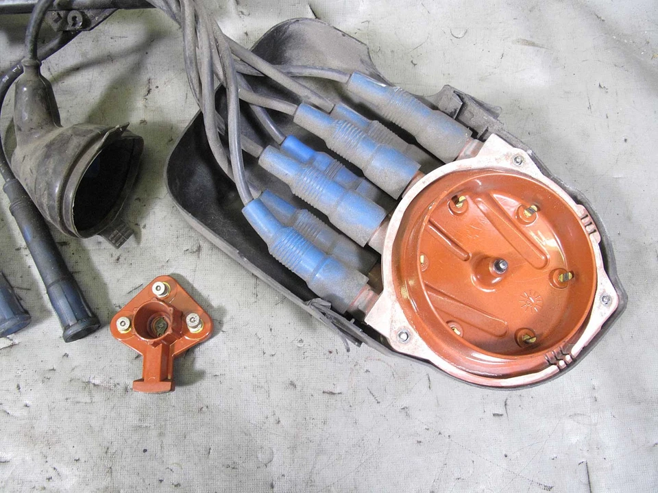 Juego de tapa y rotor distribuidor BMW E28 528e con cables Bremi 1982-1988 usado OEM Foto 2 de 4