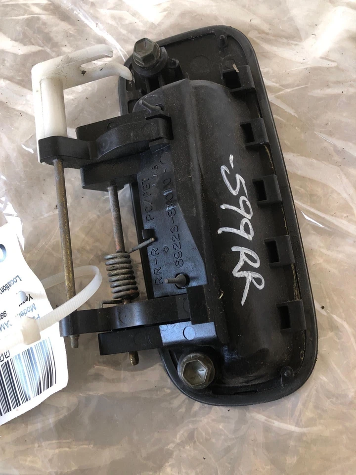 Toyota Camry 1993 sedán manija de puerta exterior trasera lado derecho del pasajero derecho OEM Foto 4 de 4