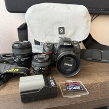 Nikon D300 12.3 MP Digital SLR Camera With 3 lenses 2 batteries and camera bag