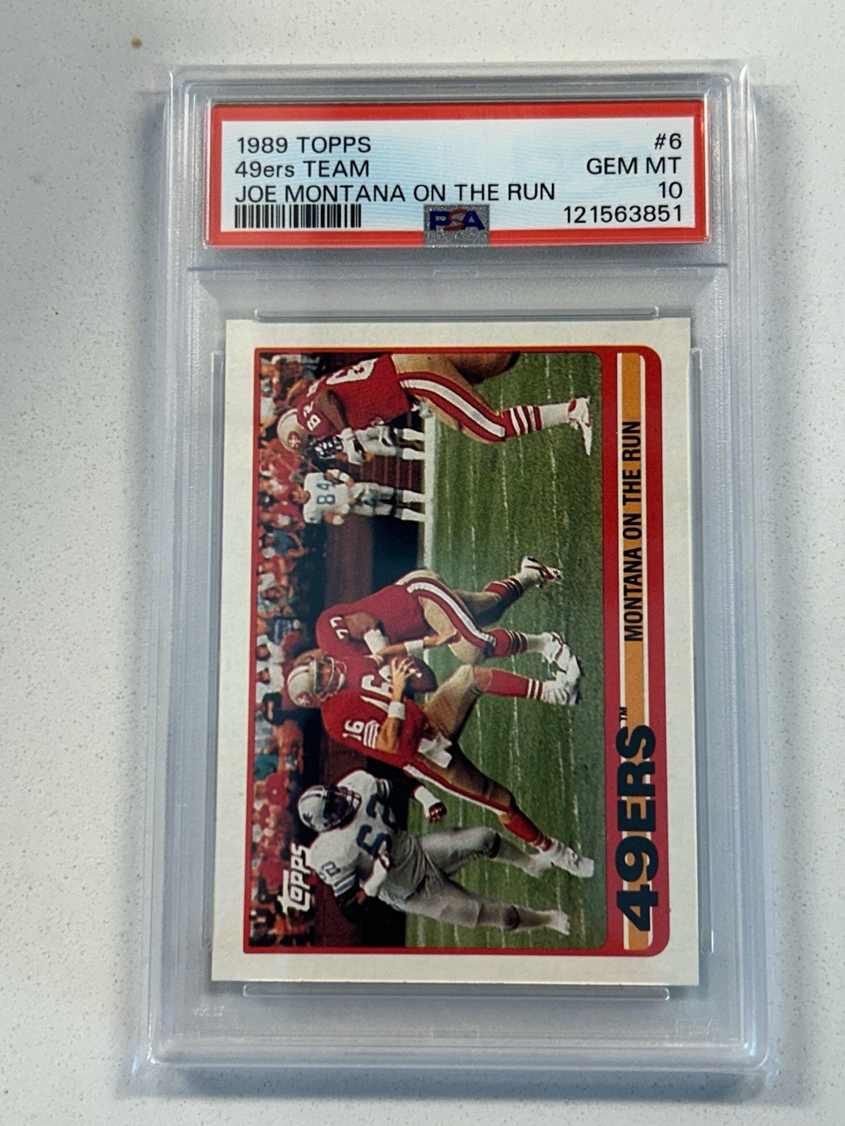 1989 TOPPS #6 JOE MONTANA HOF ON THE RUN 49ERS TEAM PSA 10