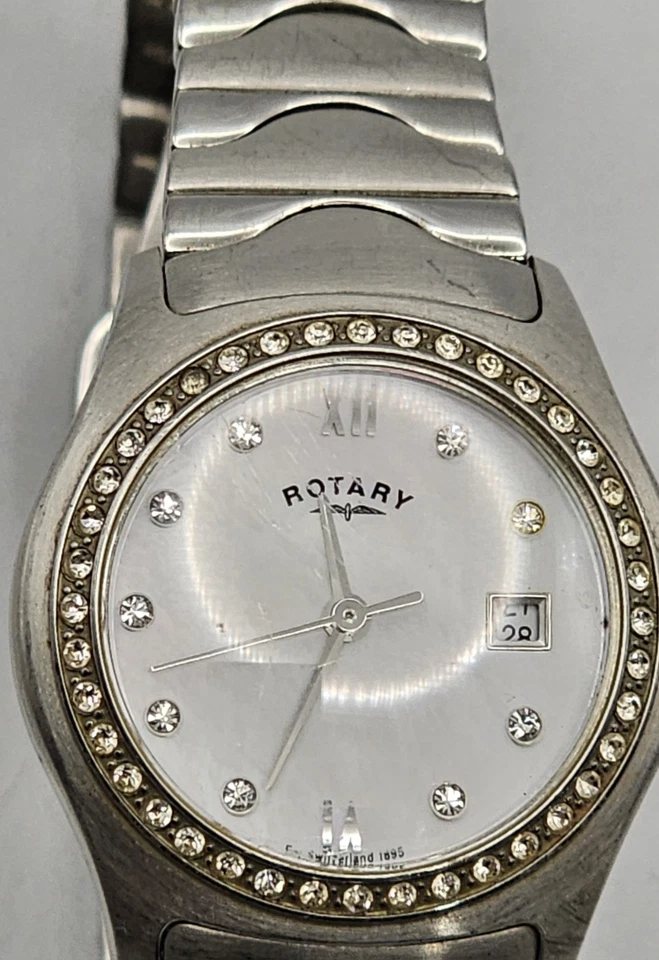 Reloj giratorio para damas con esfera de madreperla bisel de cristal informe/repuesto Foto 2 de 2