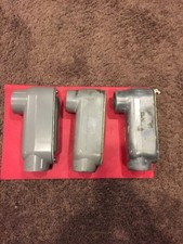 1 NEW APPLETON LB ,1-1/2" & 2 USED 1 1/4 LBs W/COVERS AND GASKETS