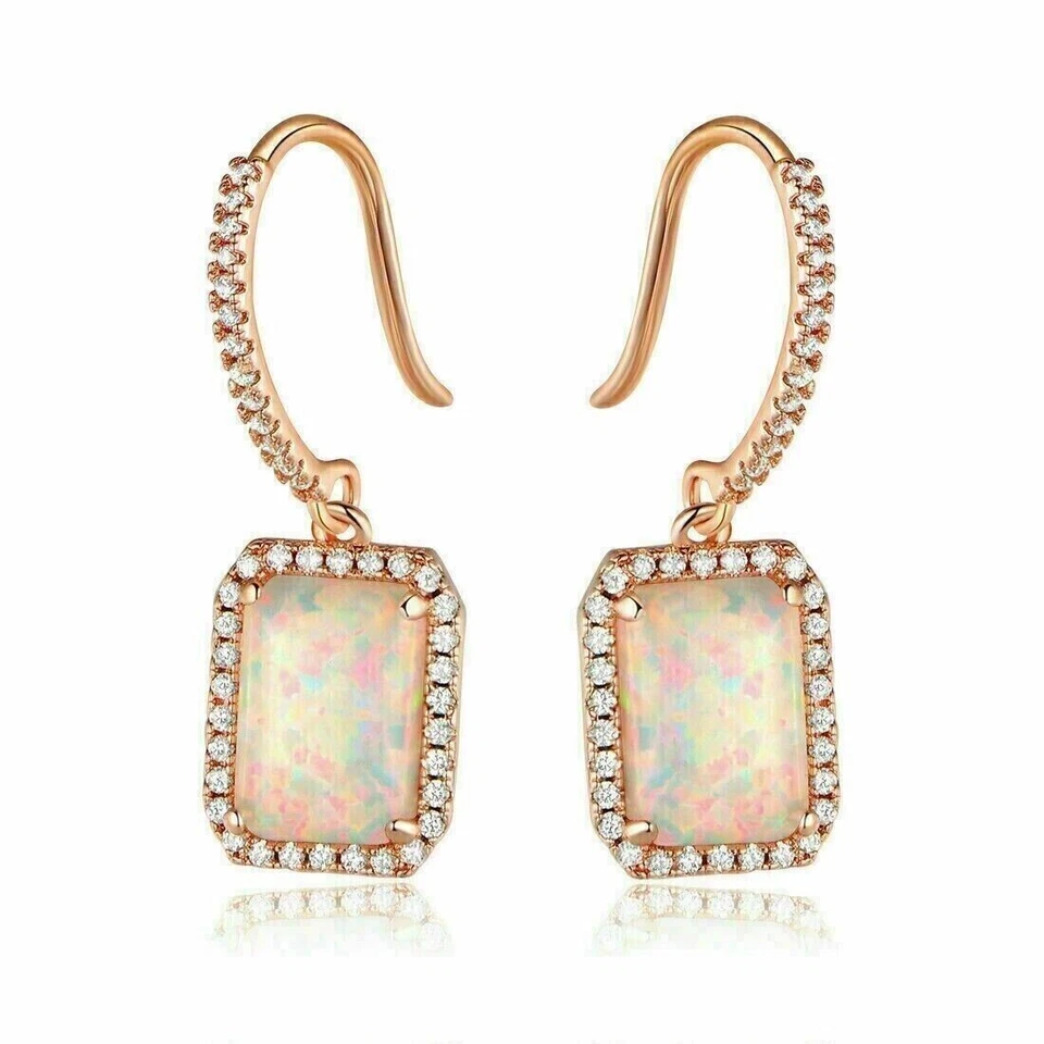 Pendientes colgantes/gotas de ópalo de fuego creados en laboratorio con corte esmeralda de 2 quilates acabado en oro rosa de 14 k Foto 4 de 4