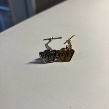 Two REVCO Award Pins