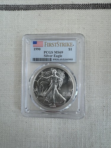 1990 $1 AMERICAN SILVER EAGLE PCGS MS69 FLAG FIRST STRIKE LABEL