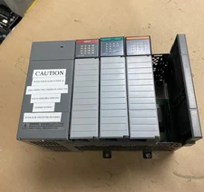 ALLEN BRADLEY SLC 500 1746-A4 SER B 4-SLOT RACK WITH POWER SUPPLY WITH MODULES