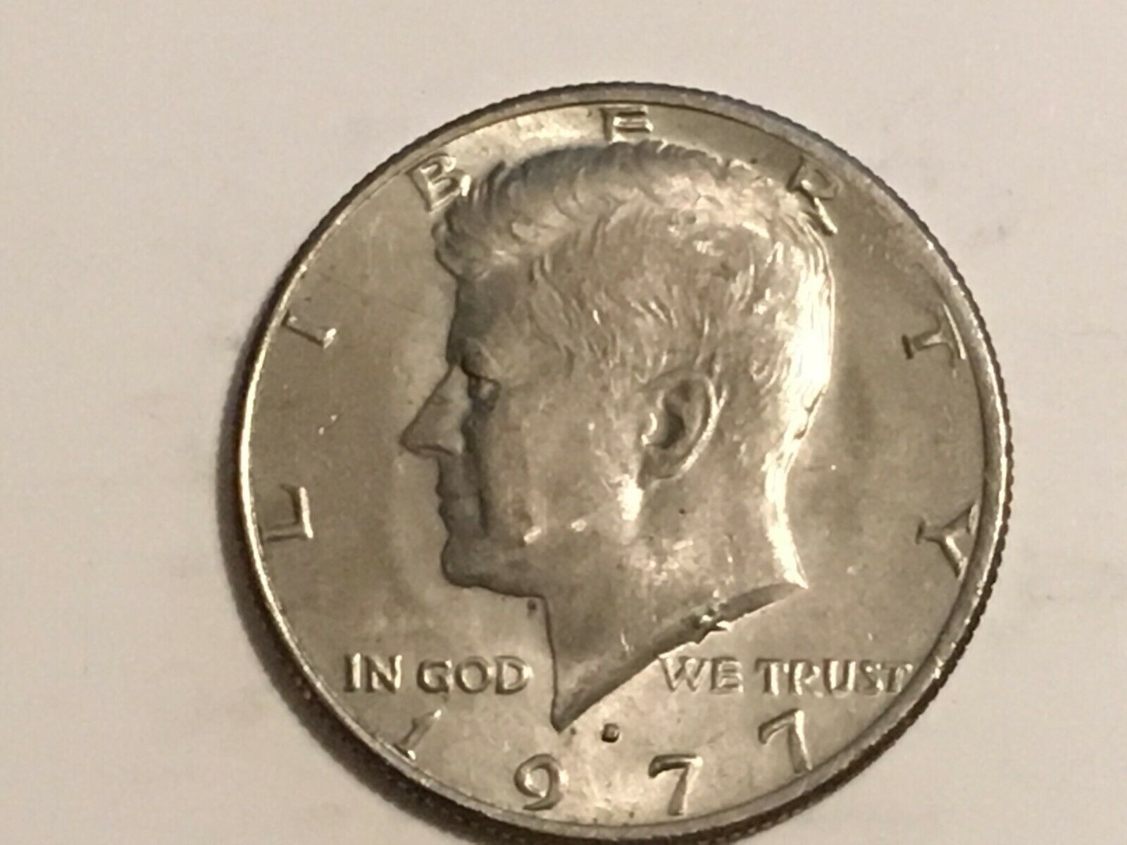 1977 D Kennedy Half Dollar error coin reverse machine doubling A