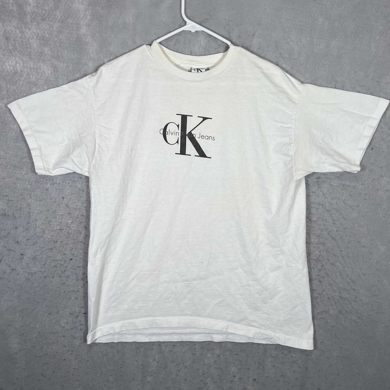 Vintage 90s Calvin Klein Classic Logo T Shirt Adult Large White Made In USA Mens | eBay Vintage 90s Calvin Klein Classic Logo T Shirt Adult Large White Made In USA Mens | eBay