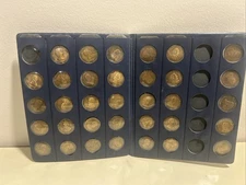 A Coin History Of Our US Presidents. 34 Coins in Book Style Presentation.