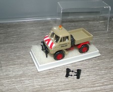 Brekina  Unimog 411 , Pritsche,  Bau AG H1979