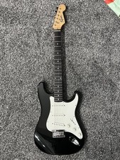 Squire Bullet Strat In Black And White With Professional Set Up