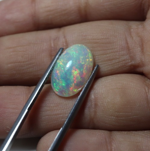 4,1 kt 14,9 x 9,5 mm Natürlicher AAA Grün Rot Feuer Äthiopischer Opal Oval Cabochon - Bild 4 von 13