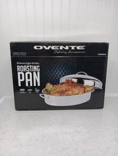Ovente stainless steel roasting pan #CWR321615 new in box. With rack and lid.