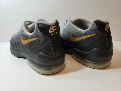 Nike air max invigor black and gold outlet
