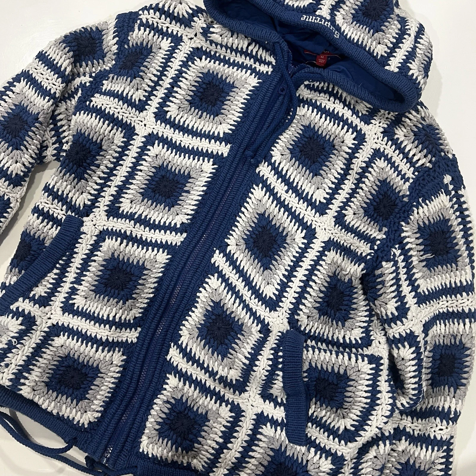 Sweat à capuche zippé au crochet suprême