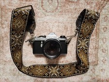 PENTAX ASAHI ME 35MM FILM CAMERA WITH STRAP AND LENS