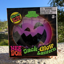 Nee Doh Jack-Glow Lantern Glow-in-the-Dark Squish Squeeze Toy, Purple, 4