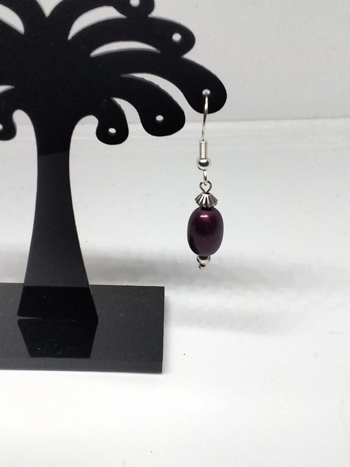 Pendientes de cuentas milagrosas rosas inusuales con detalles de plata Foto 2 de 4