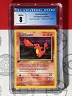 CGC 8 NM/MINT 2000 Pokemon TCG Charmander Team Rocket 1st Edition 50/82 PSA 1034