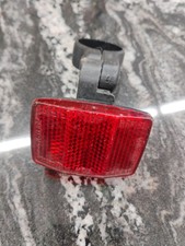red plastic bicycle rear reflector