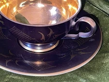 Schirnding Bavaria Gold on Black Footed Teacup and Saucer