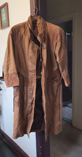 A 1990s Macy's vintage leather duster trench two brown color panels.