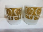 2 vintage Fire King gold daisy milk glass coffee mugs