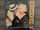 Madonna.  I’m Breathless.  Sealed. Music inspired by film Dick Tracy