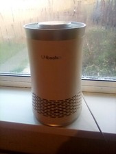 air conditioning unit unbeaten white excellent condition could do with a clean .
