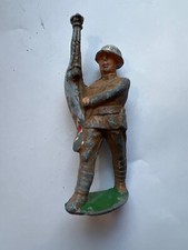 World war 1 antique metal soldier holding flag