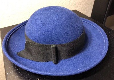 the girl in the bowler hat