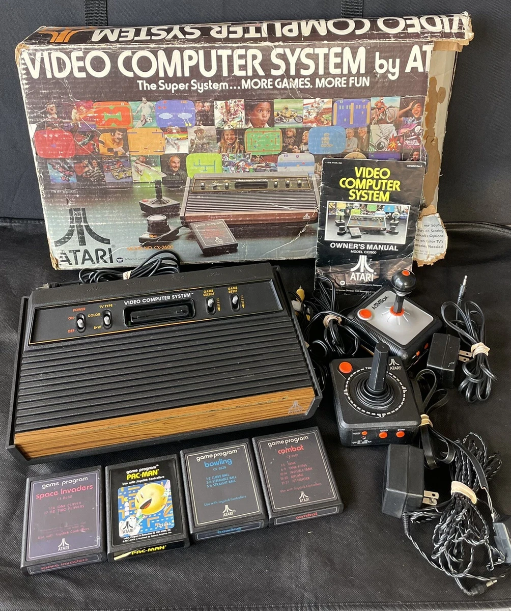 Original Atari 2600 System in Original Box + 4 Games, 2 Joysticks and  Manual.