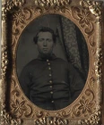 Cased 9th plate ruby ambrotype of an unidentified Union private wearing a frock