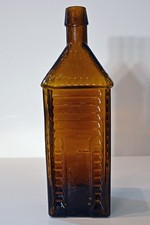 ANTIQUE OLD HOMESTEAD BITTERS BOTTLE