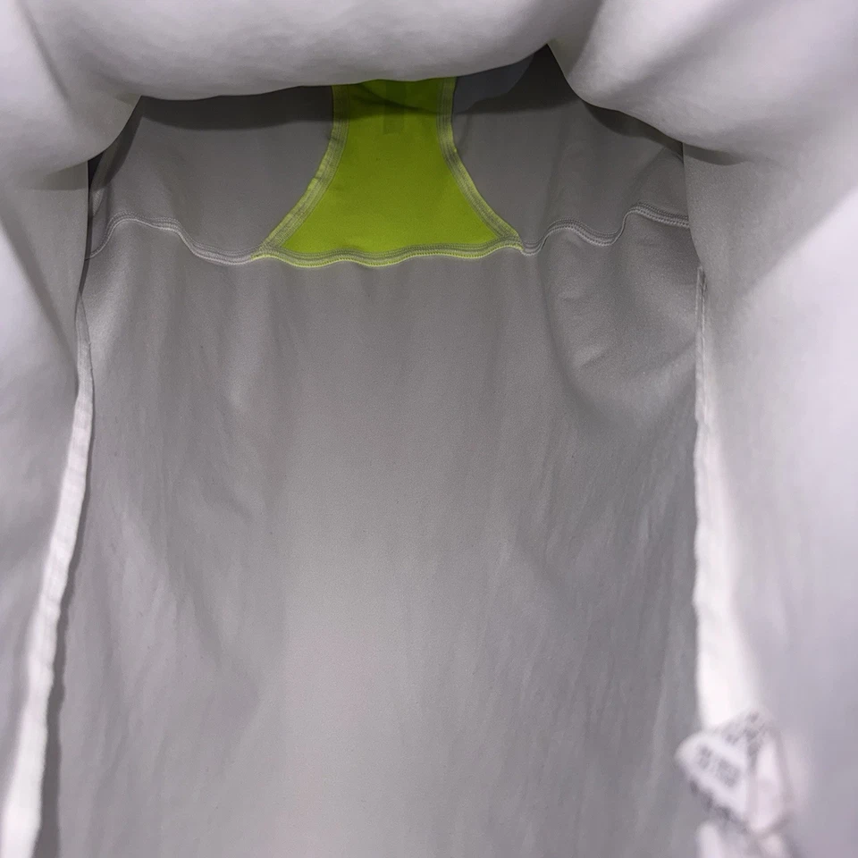 Camiseta para mujer Under Armour HeatGear Run semiajustada blanca amarilla neón malla trasera Foto 3 de 4