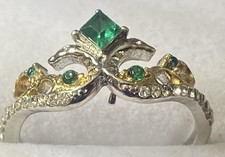 Ladies unmarked silver emerald & cubic zirconia ring.