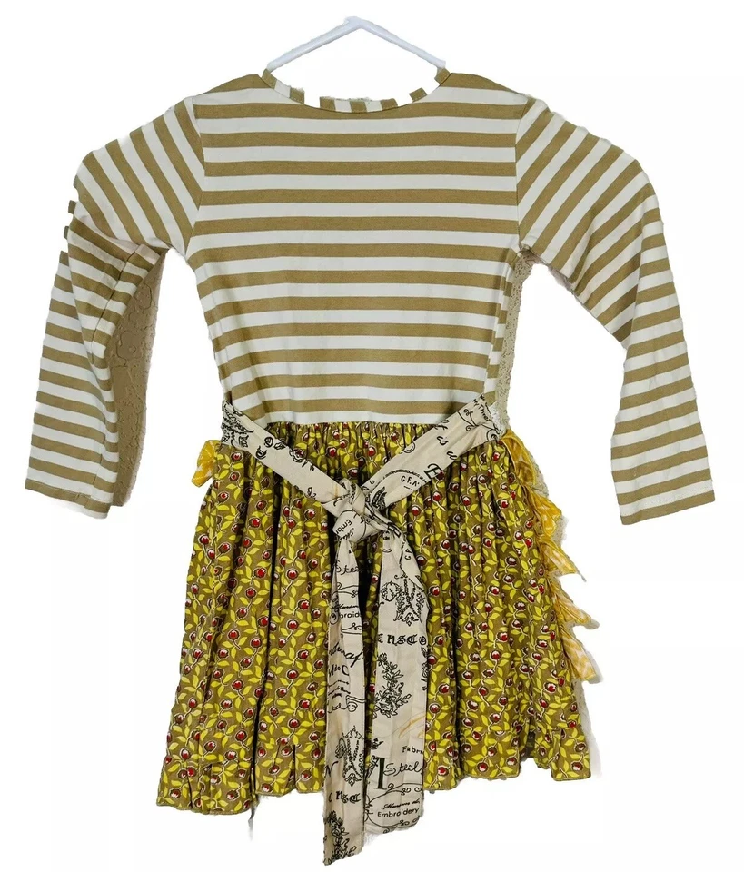 Vestido Delantal Manga Larga Estampado Mixto y Encaje Mostaza Pie Niña - Talla 3T Foto 2 de 4