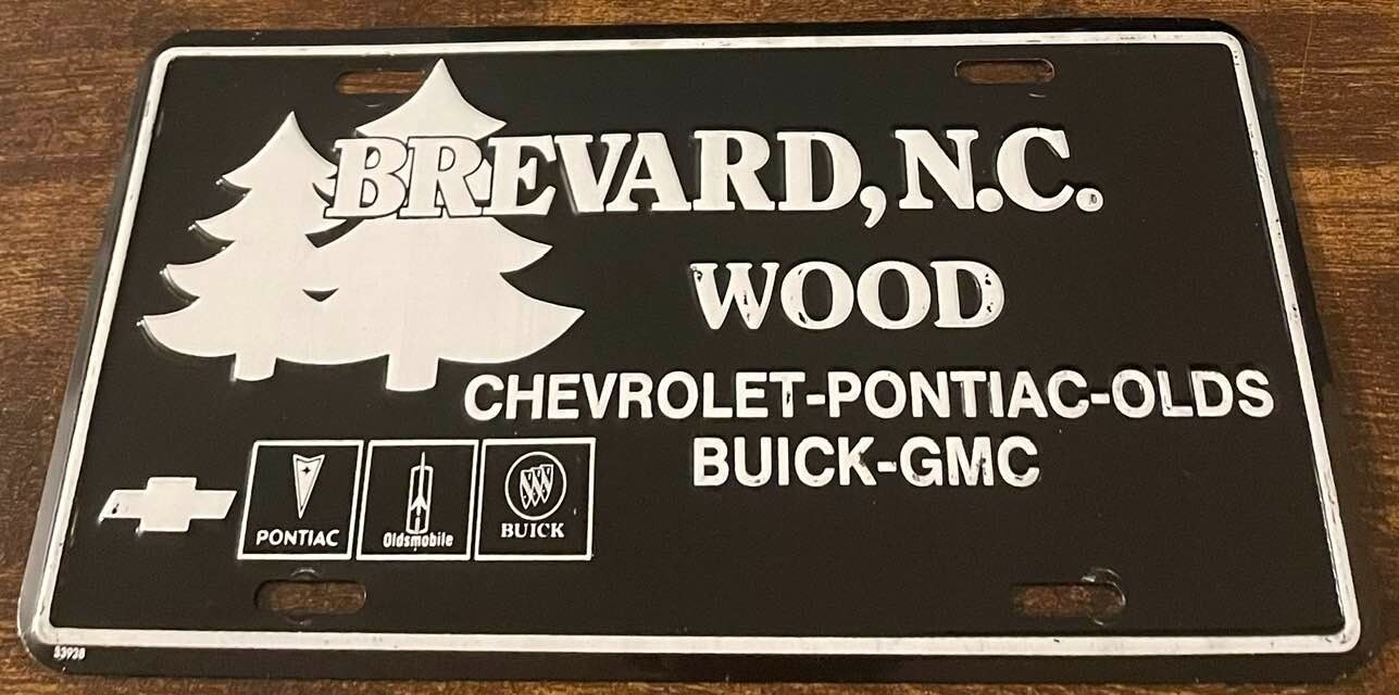 Brevard NC Wood Chevrolet Dealership Booster License Plate Pontiac Olds
