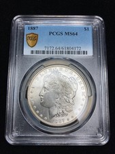 PCGS Certified MS 64 Graded 1887 Year Morgan US Dollars (1878-1921