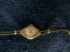 Antique? Bulova Ladies Wrist Watch Cord Band & Steel Hinge 10kt Gold Plate Oval 