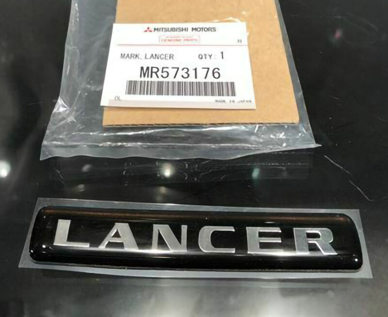 MITSUBISHIエンブレム Genuine OEM Mitsubishi Lancer Evolution VI Rear Emblem Badge Logo