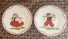 VINTAGE HAND PAINTED DUTCH GIRL AND BOY SCALLOPED EDGE PLATES SET OF 2